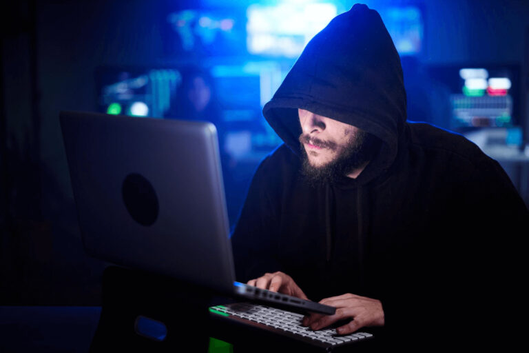 Image of a hacker working on domain spoofing.