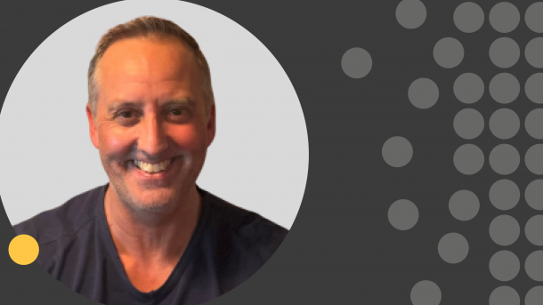 Professional headshot of Paul Walsh